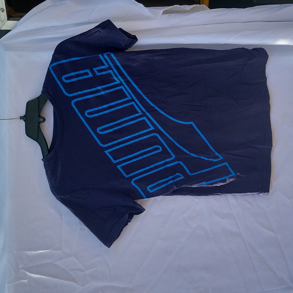 Puma t short. Dark blue with light blue graphics.